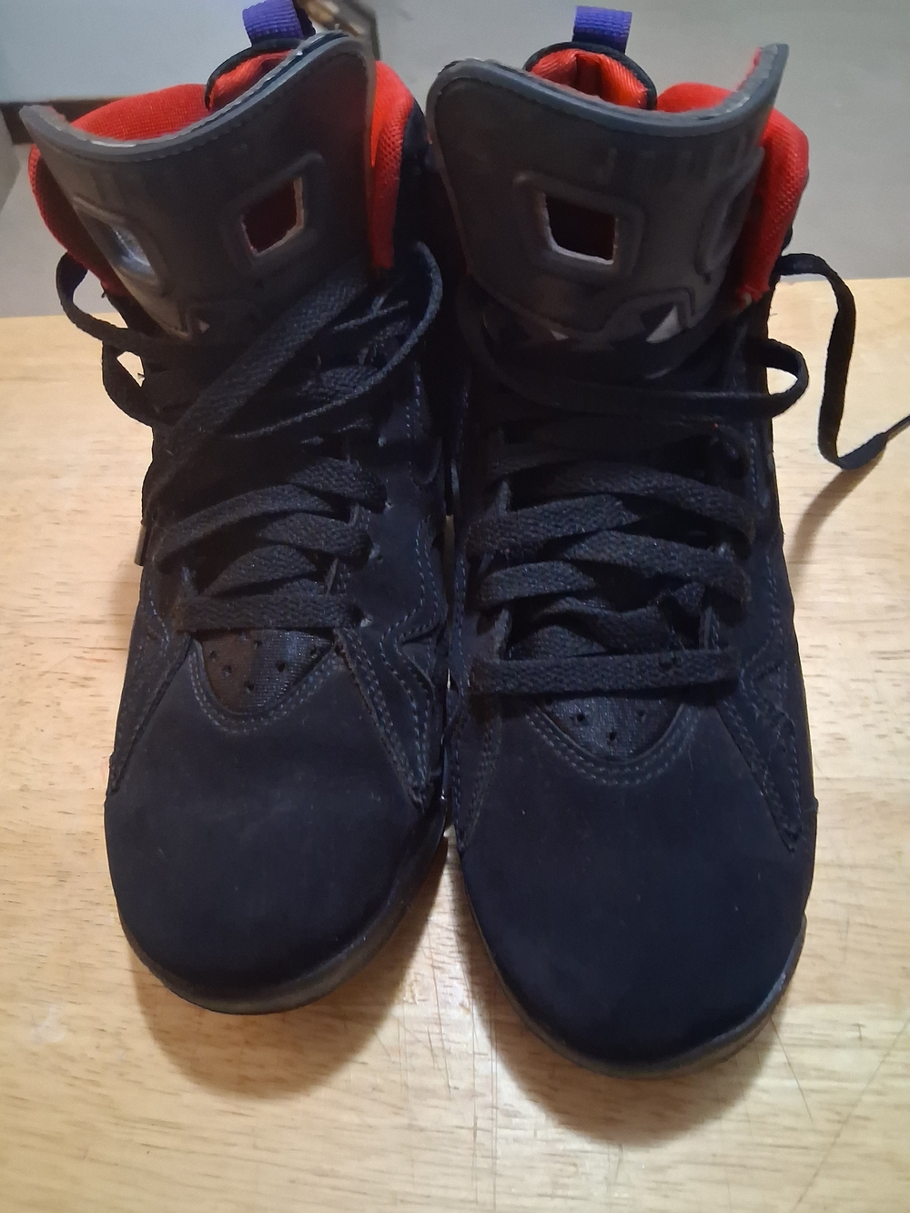 Jordas6 Retro Black High-Top Sneakers with Red Lining and Purple Pull Tab